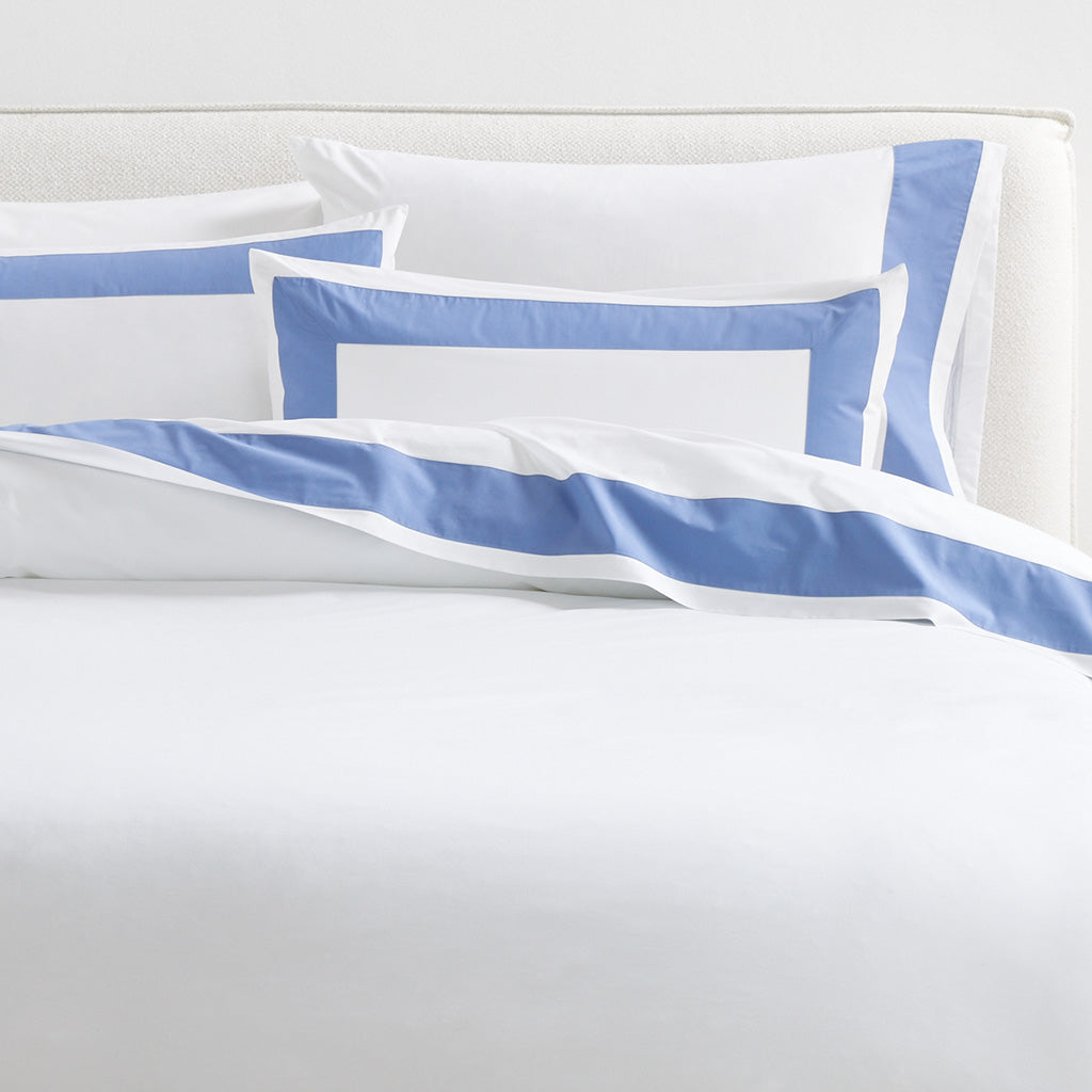 Set of 2 Blue Wide-Band Percale Pillow Shams with 4-inch blue border on white cotton percale.