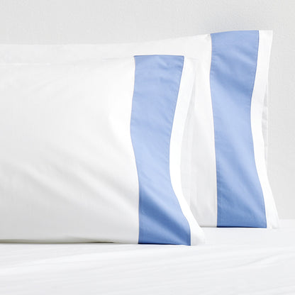 Set of 2 white percale pillowcases with a vertical blue wide-band design.