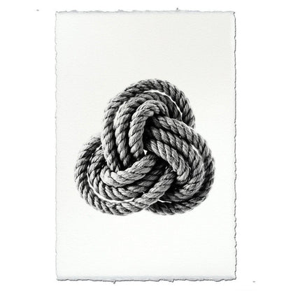 Black and white Carrick Nautical Knot rope art print on handmade Nepalese paper with deckled edges.