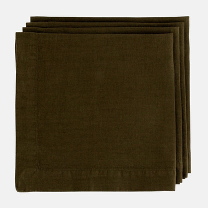 Stack of three Cedar HG Signature hand-dyed dark mossy green linen napkins, 22-inch square.