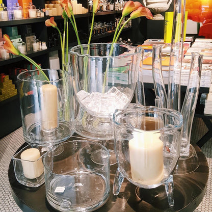 Large Cis mouth-blown glass bowl with scissor-cut rim, clear, 11.5"Dia x 12"H, displayed with candles and flowers.