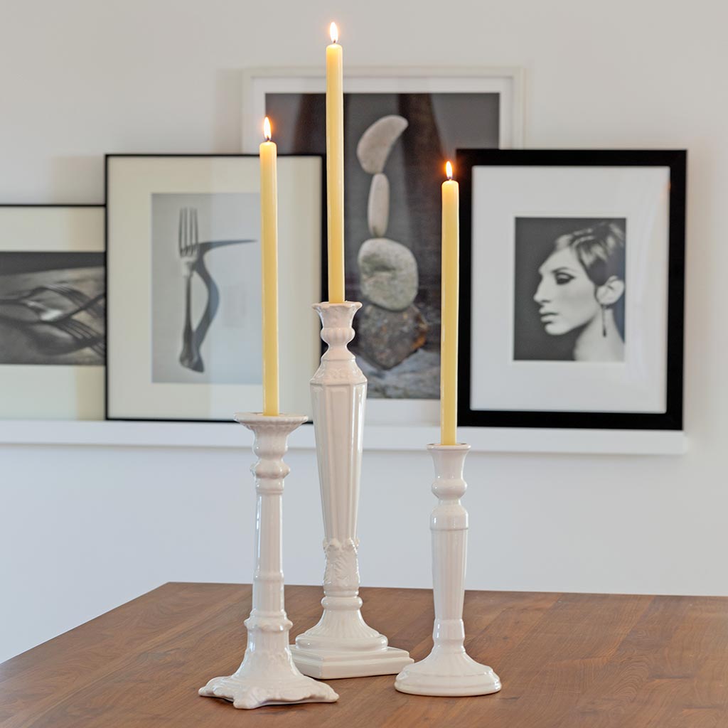 White Column Candlesticks on table