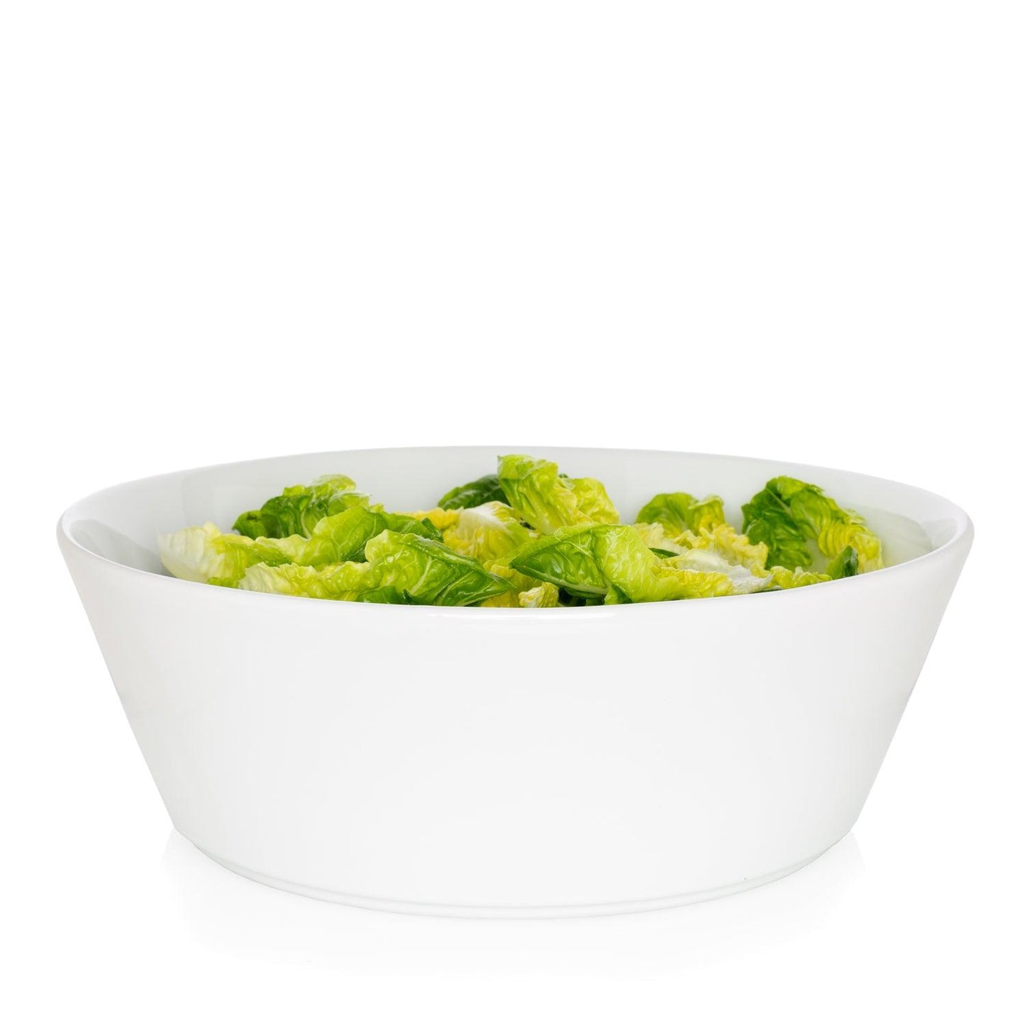 Corno Ceramic Serve Bowl, creamy white earthenware, 12.5" Dia, filled with green lettuce.