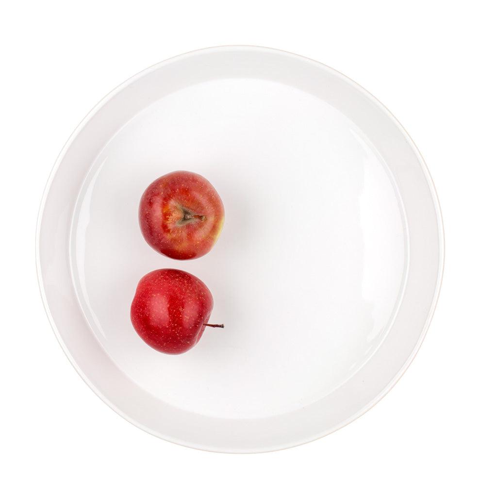 Corno Ceramic Serve Bowl, creamy white glaze, 12.5" Dia x 4.5" H, with two red apples.