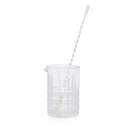 Clear square-cut crystal cocktail mixing glass with pour spout and silverplate long bar stirrer.