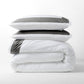 Dark Grey Wide-Band Percale Duvet Cover and shams, folded and stacked, with a 4" wide band.