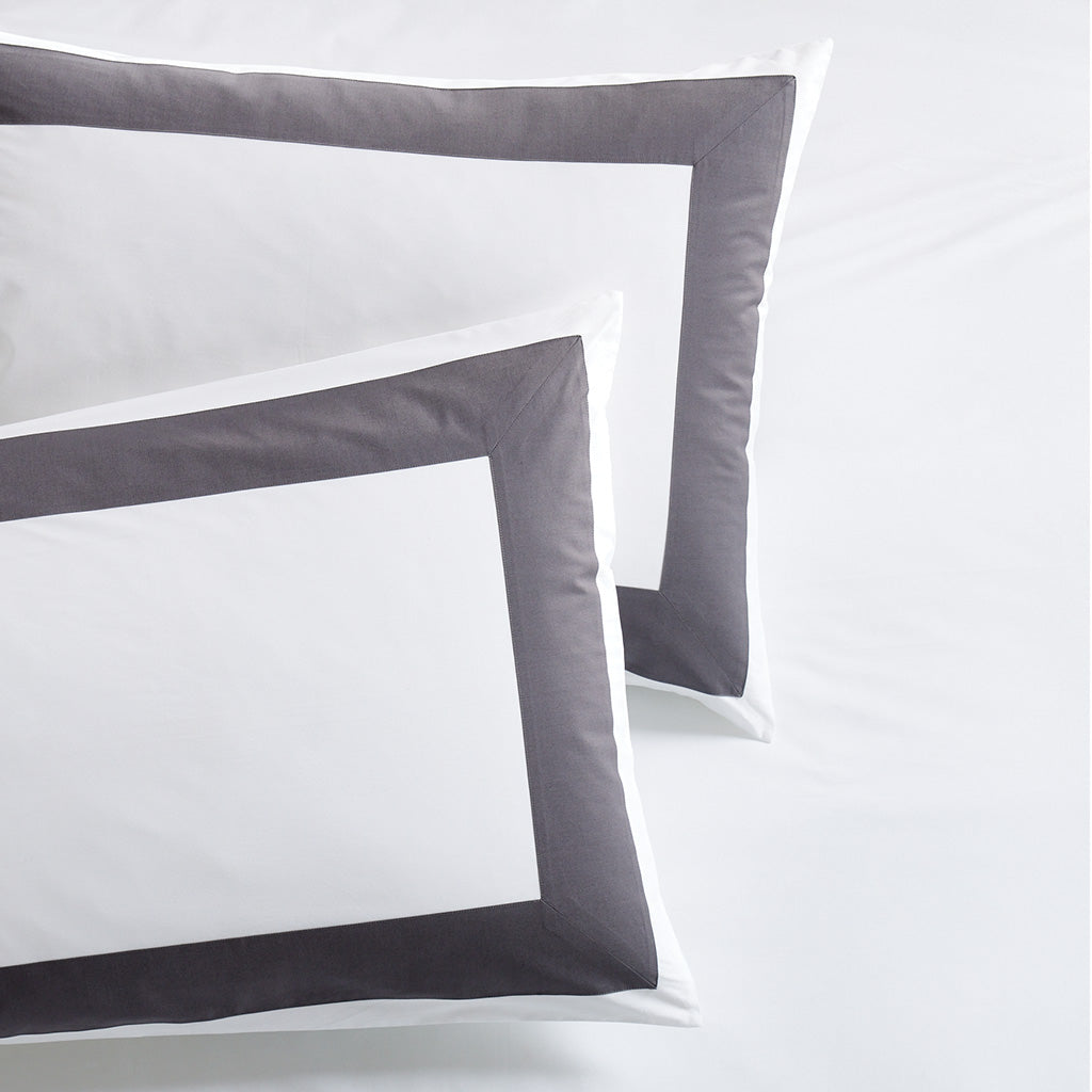 Two Dark Grey Wide-Band Percale Pillow Shams, 500-thread-count, with a 4-inch appliqued border.