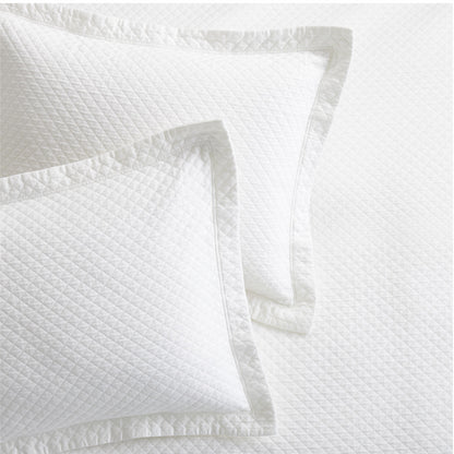 Diamond White Cotton Matelassé Pillow Shams with subtle diamond pattern and tailored 2-inch hem.