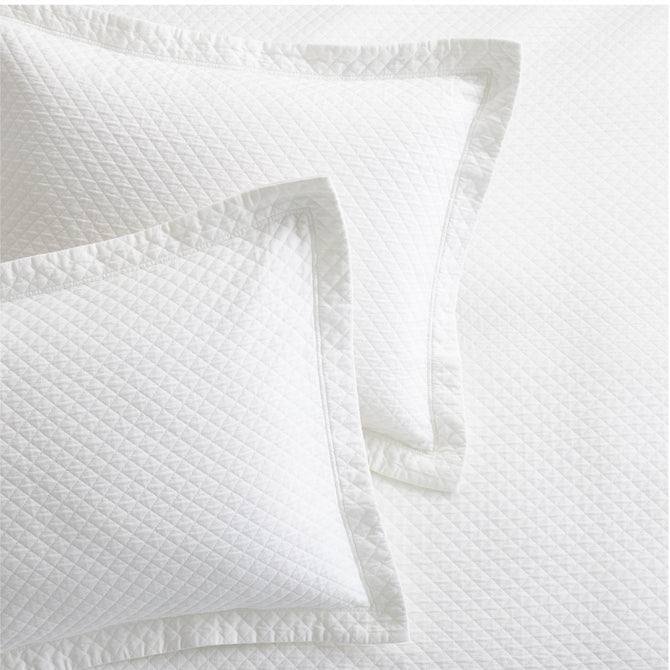 Diamond White Cotton Matelassé Pillow Shams with subtle diamond pattern and tailored 2-inch hem.