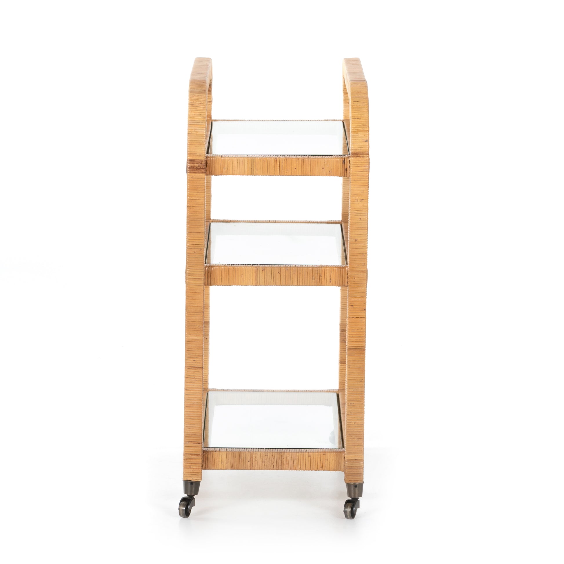Dory Rattan Bar Cart, honey-finished rattan with three glass tiers and wheels.