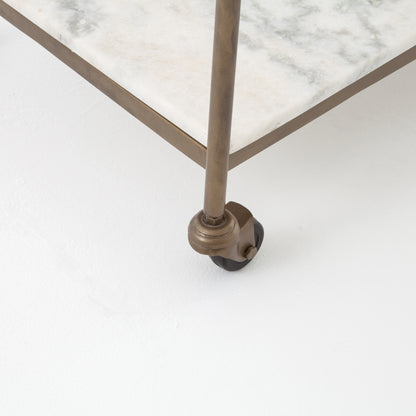 Felix Antique Brass and White Marble Rectangular Bar Cart with casters.