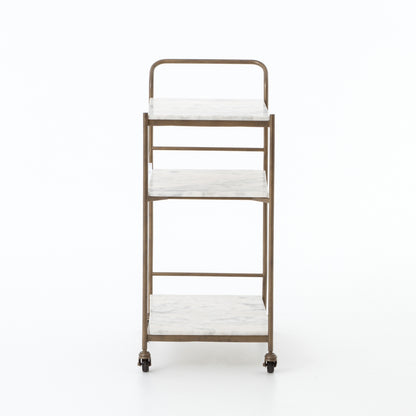 Felix antique brass bar cart with three rectangular white marble shelves and casters.
