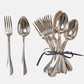 Vintage French silverplate flatware set: 6 ornate forks, 6 spoons, one bundle tied with a gray ribbon.