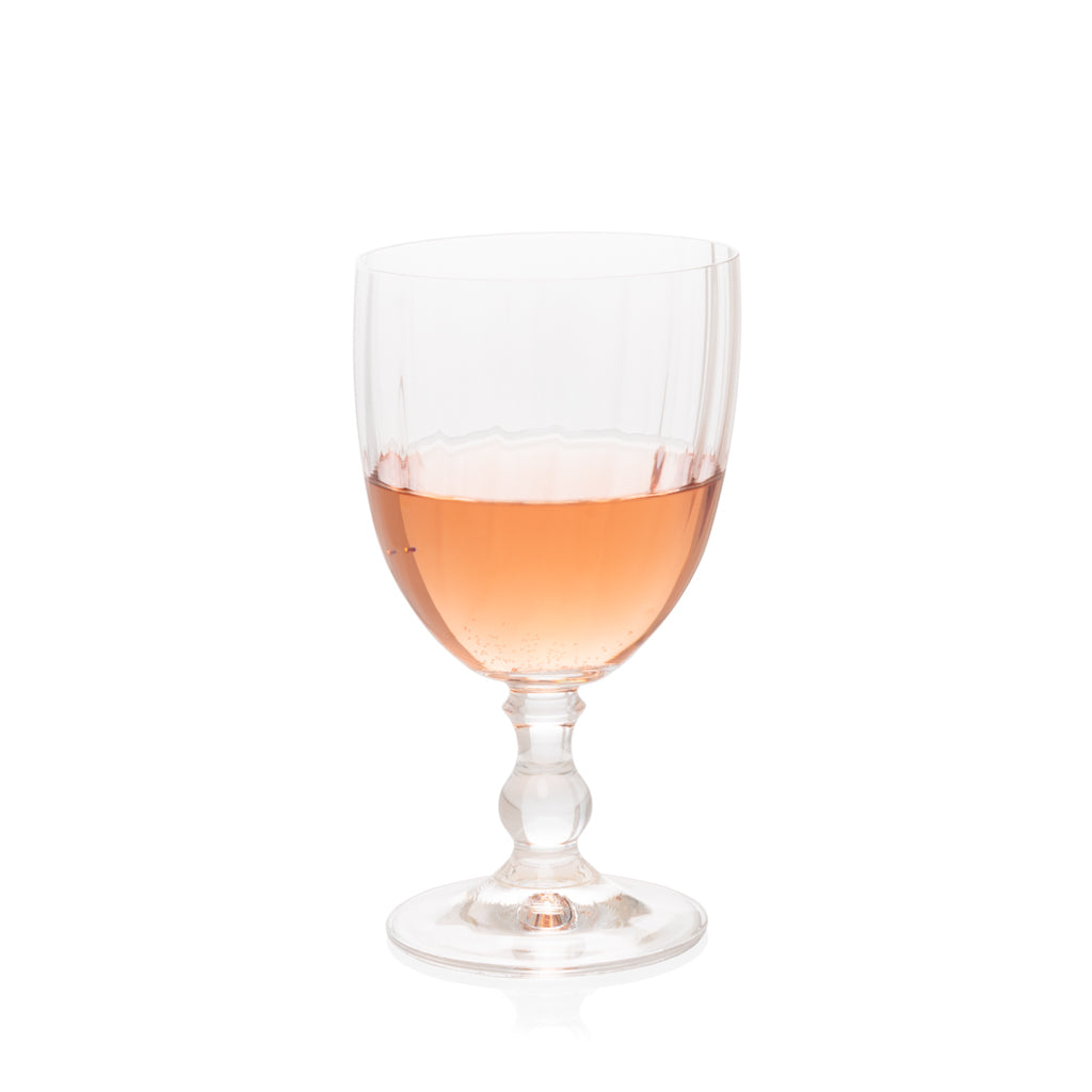 Georgia Eco-Crystal Stemmed Wine Glass, 12oz, with ribbed clear glass and pink rosé wine.