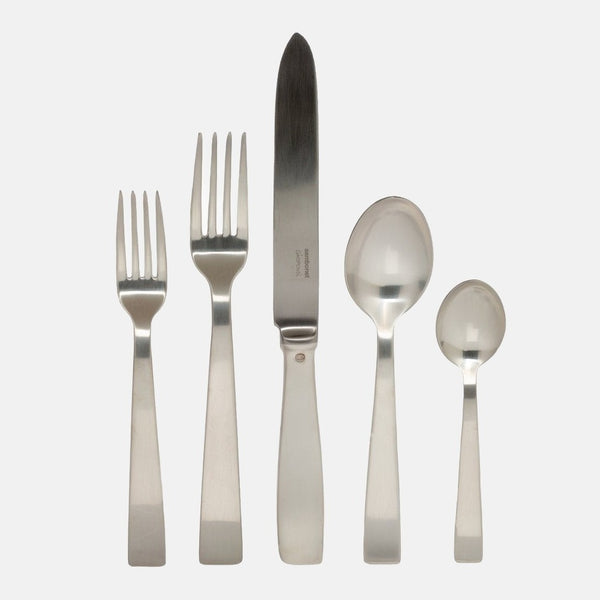 Gio Ponti 5-piece satin silverplate flatware set: two forks, knife, and two spoons on a light background.