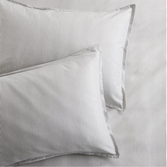 Set of 2 grey stripe cotton-chambray pillow shams with thin stripes and a 2” flange.