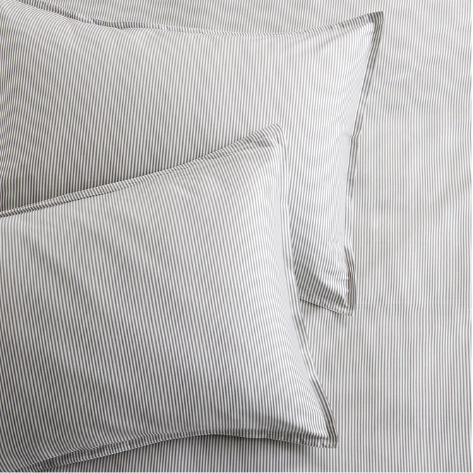 Set of 2 grey stripe cotton-chambray pillow shams with thin stripes and a 2” flange.
