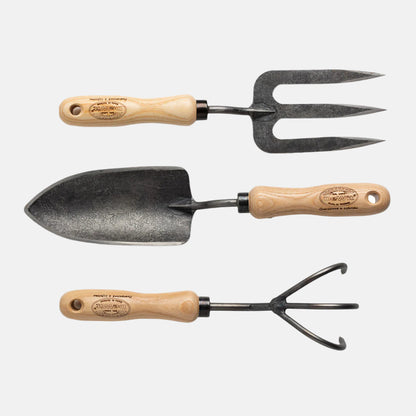 3-piece hand-forged steel garden tool set with ash hardwood handles: trowel, fork, and 3-tine cultivator.