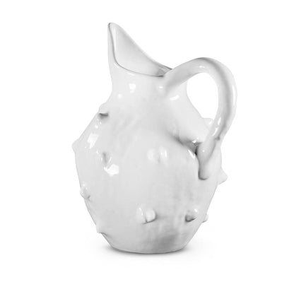 Handmade creamy white ceramic bumpy pitcher by Montes Doggett, 6.5"Dia x 11"H.