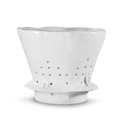 Handmade creamy white ceramic colander by Montes Doggett, 9.5"Dia x 7.5"H, with wavy rim and drain holes.
