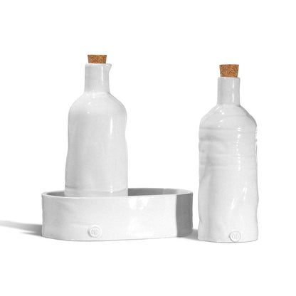 Handmade creamy white ceramic oil and vinegar cruets with corks, on a matching tray. Montes Doggett design.