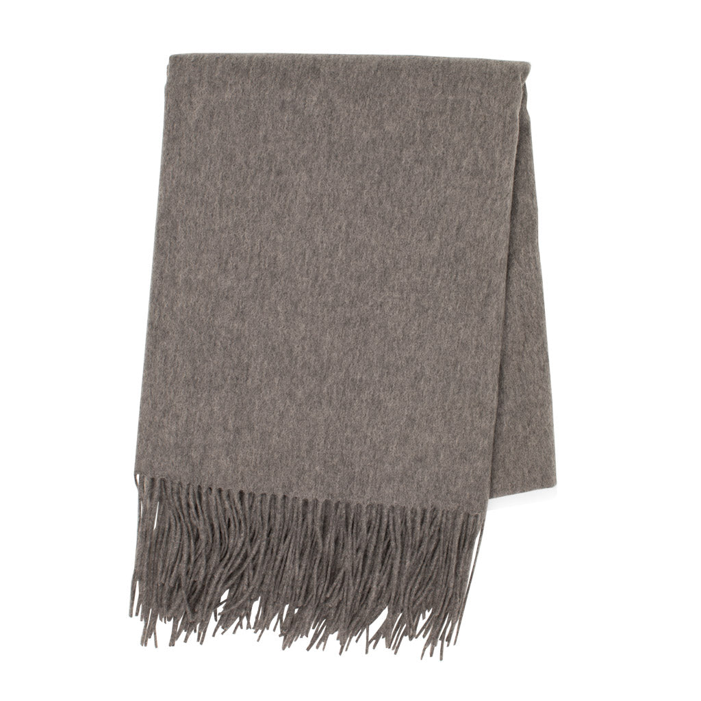 Heather grey cashmere throw blanket, folded, with classic fringe.
