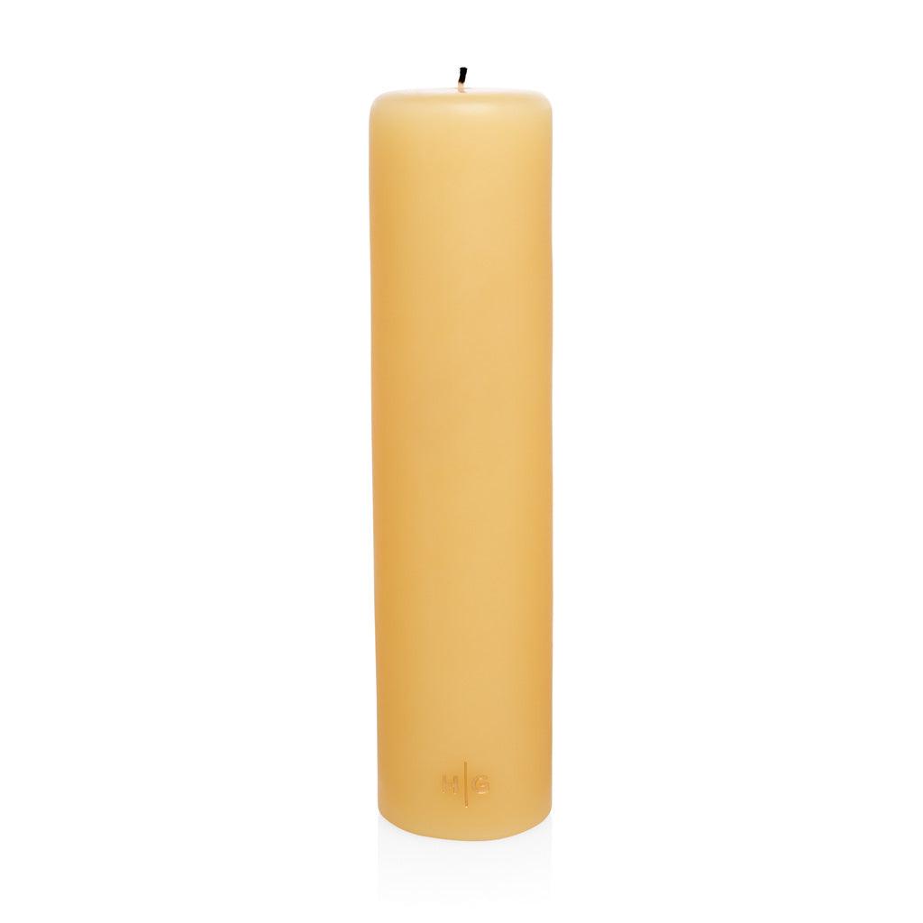 HG Amber Unscented 3"x12" paraffin pillar candle with gold embossed HG logo.