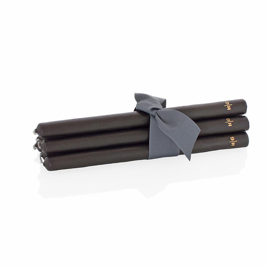 Set of 5 HG Black 12" taper candles, hand-dipped paraffin, with gold HG logo and gray ribbon.