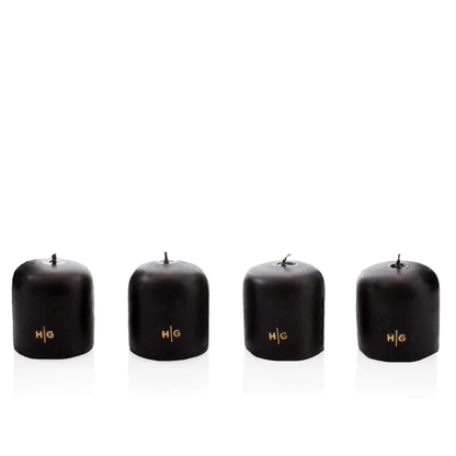 Set of 4 HG Black Unscented 2" Votive Candles, hand-dipped paraffin with gold HG logo.