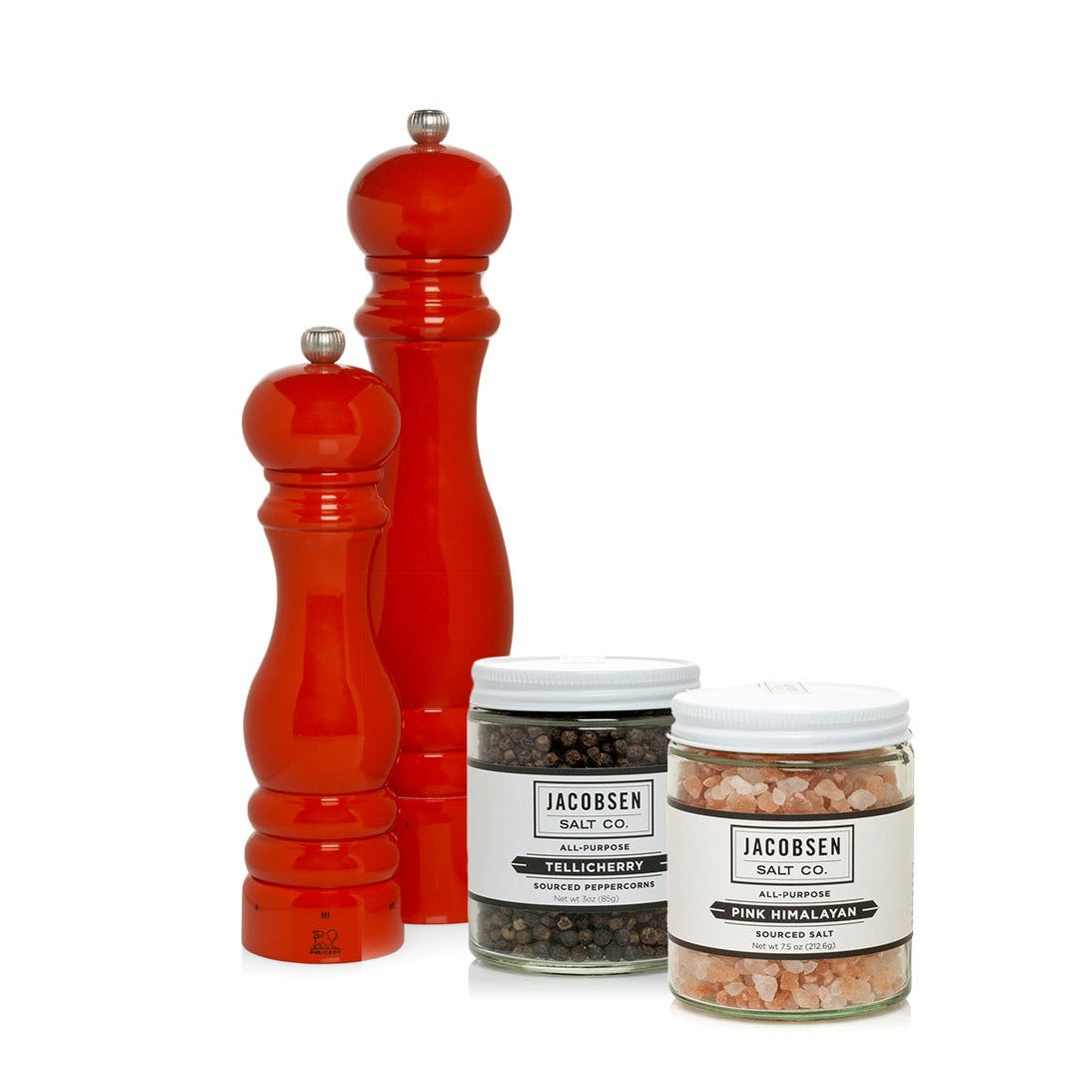 HG International Orange Salt & Pepper Gift Set: two red beechwood mills, Jacobsen Tellicherry peppercorns, and Pink Himalayan salt.