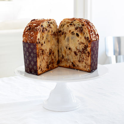 HG Original Medium Pedestal Cake Stand, creamy white ceramic, 13" diameter, 5.5" H, with a cut panettone.