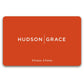 Hudson Grace eGift Card, bright orange with white "HUDSON GRACE" logo and "A house. A home." tagline.