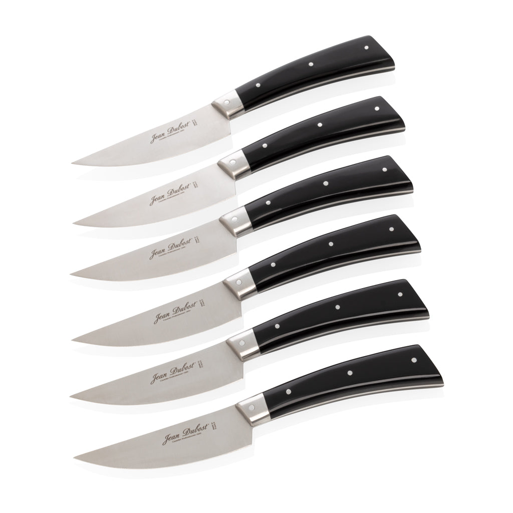 Set of 6 Jean Dubost steak knives with black ABS handles and stainless steel blades.