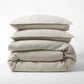 Khaki Washed-Linen Duvet Cover set, folded with two shams, showcasing the medium-weight Italian flax linen.