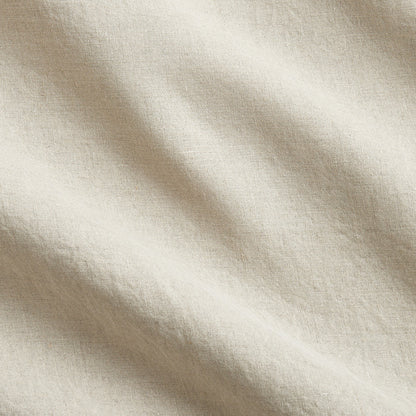 Khaki washed-linen pillow sham fabric with subtle wrinkles and natural texture.
