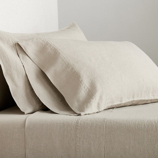 Khaki Washed-Linen Sheet Set with two pillowcases, showing the medium-weight, casually relaxed fabric.