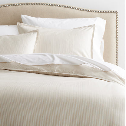 Khaki stripe cotton-chambray duvet cover and shams with thin stripes and a 2” flange.