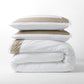 Khaki Wide-Band Percale Duvet Cover and shams, folded and stacked, with a 4" khaki band.
