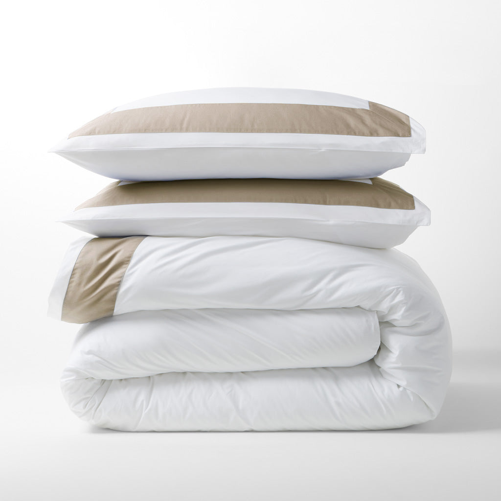 Khaki Wide-Band Percale Duvet Cover and shams, folded and stacked, with a 4" khaki band.