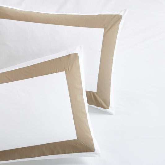 Two Khaki Wide-Band Percale Pillow Shams with a 4” wide khaki border on white cotton.