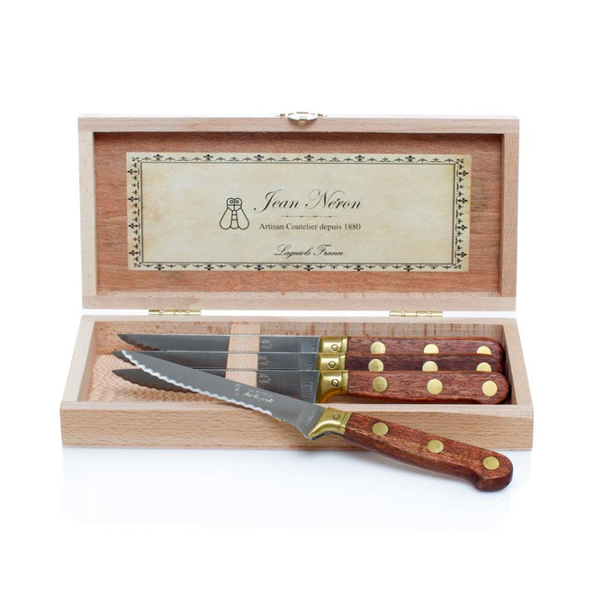 Set of 4 Laiton wood and brass stainless steel steak knives in an open wood box.