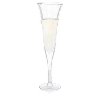 Clear, scissor-cut glass champagne flute with a rippled rim, filled with bubbly champagne.