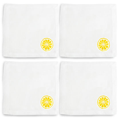 Set of 4 white linen cocktail napkins with embroidered yellow lemon slice design.