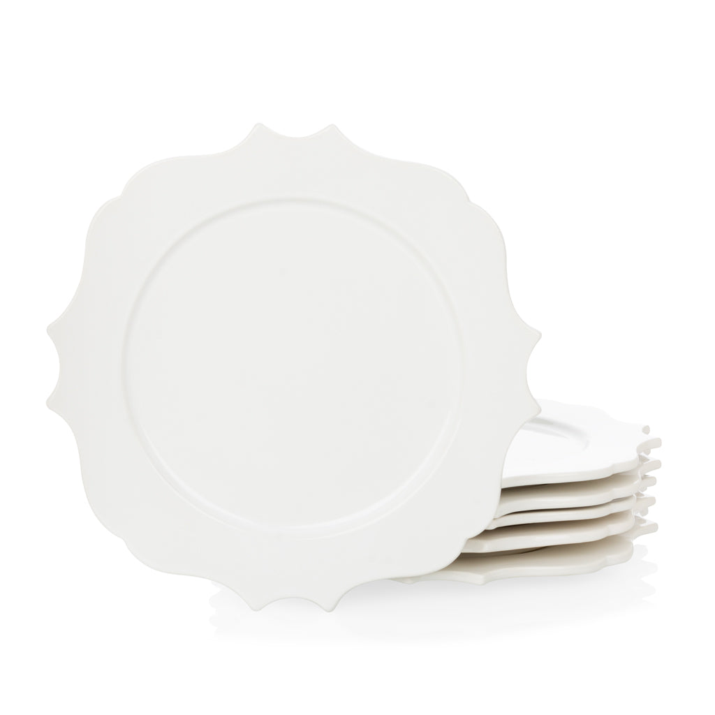 Stack of white ceramic Lungarno salad/dessert plates with sculptural, scalloped edges.