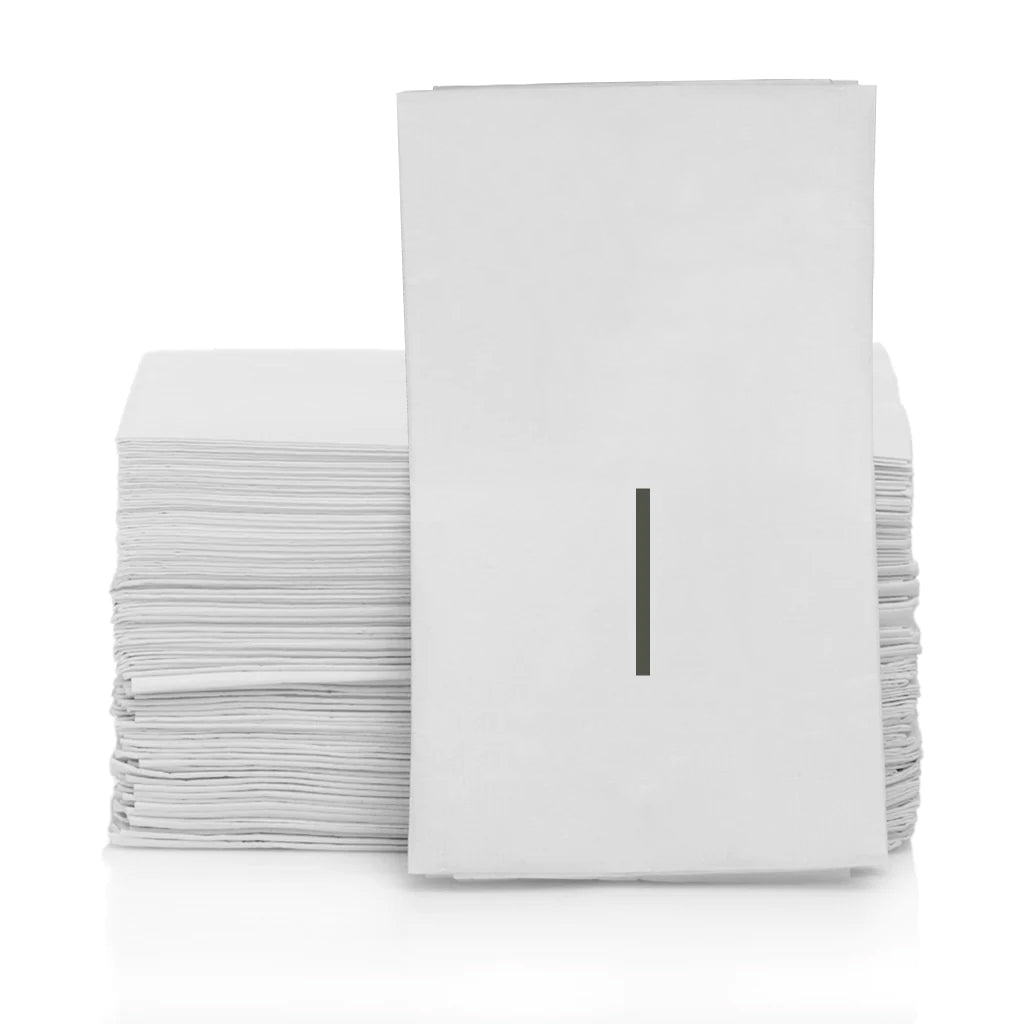 Stack of white 3-ply monogram paper hand towels with a grey letter "I" on the front.