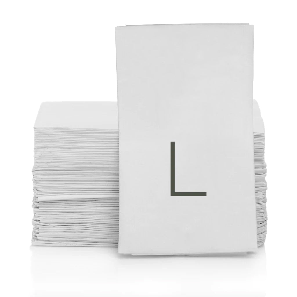Stack of white 3-ply paper hand towels with a grey monogram letter L.
