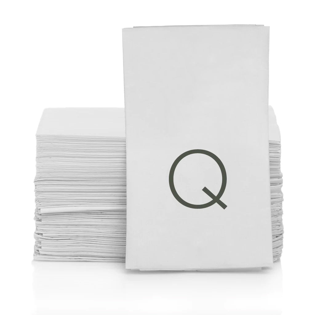 Stack of white 3-ply paper bar/hand towels with a grey monogram letter Q.