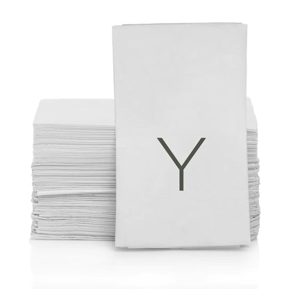 Stack of white 3-ply paper hand towels with a grey monogram "Y" on the front.