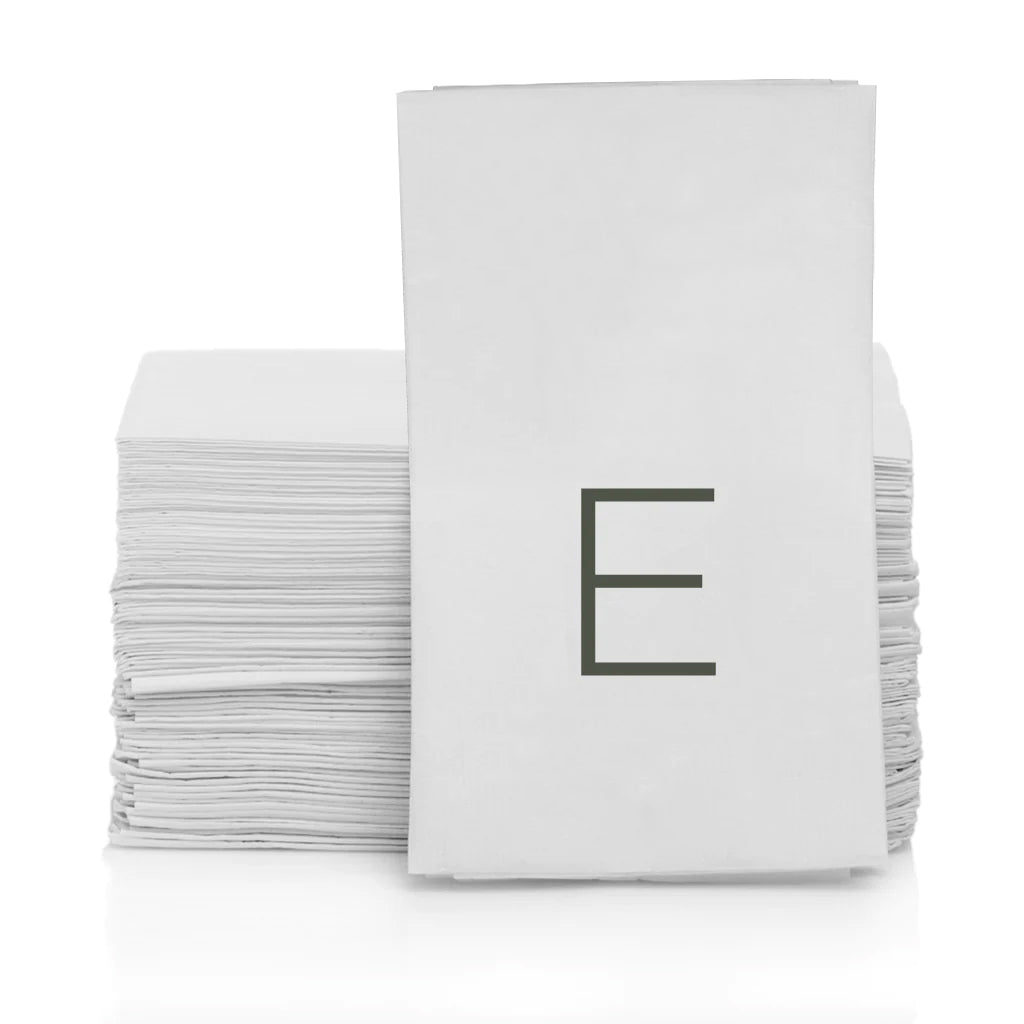 Stack of white 3-ply paper hand towels with a grey monogram letter "E" on the front.