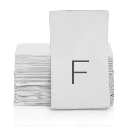 Stack of white 3-ply monogram paper hand towels with a grey letter "F" on the front.